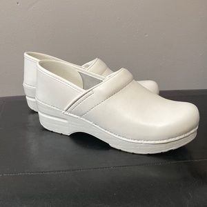White Dansko Clogs.